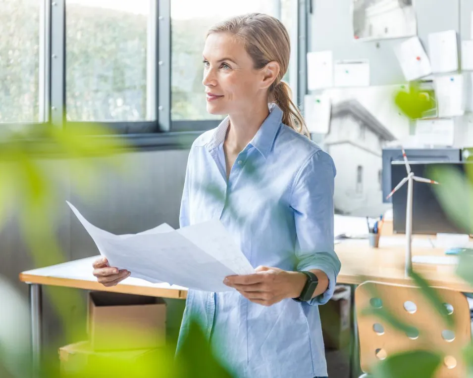 Woman in office working on energy system transformation