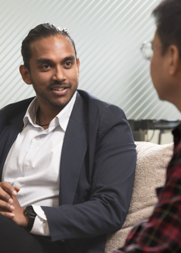 Man wearing a suit talking