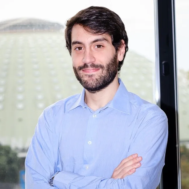 Alessandro Nuzzi portrait in a Zühlke Portugal office setting