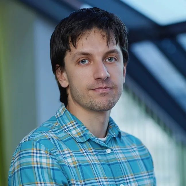 A man in a blue shirt