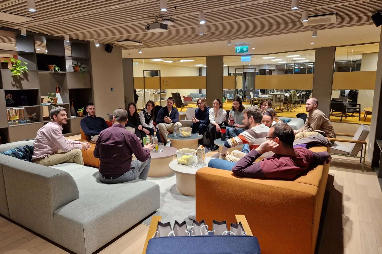 A group of people sitting in a room