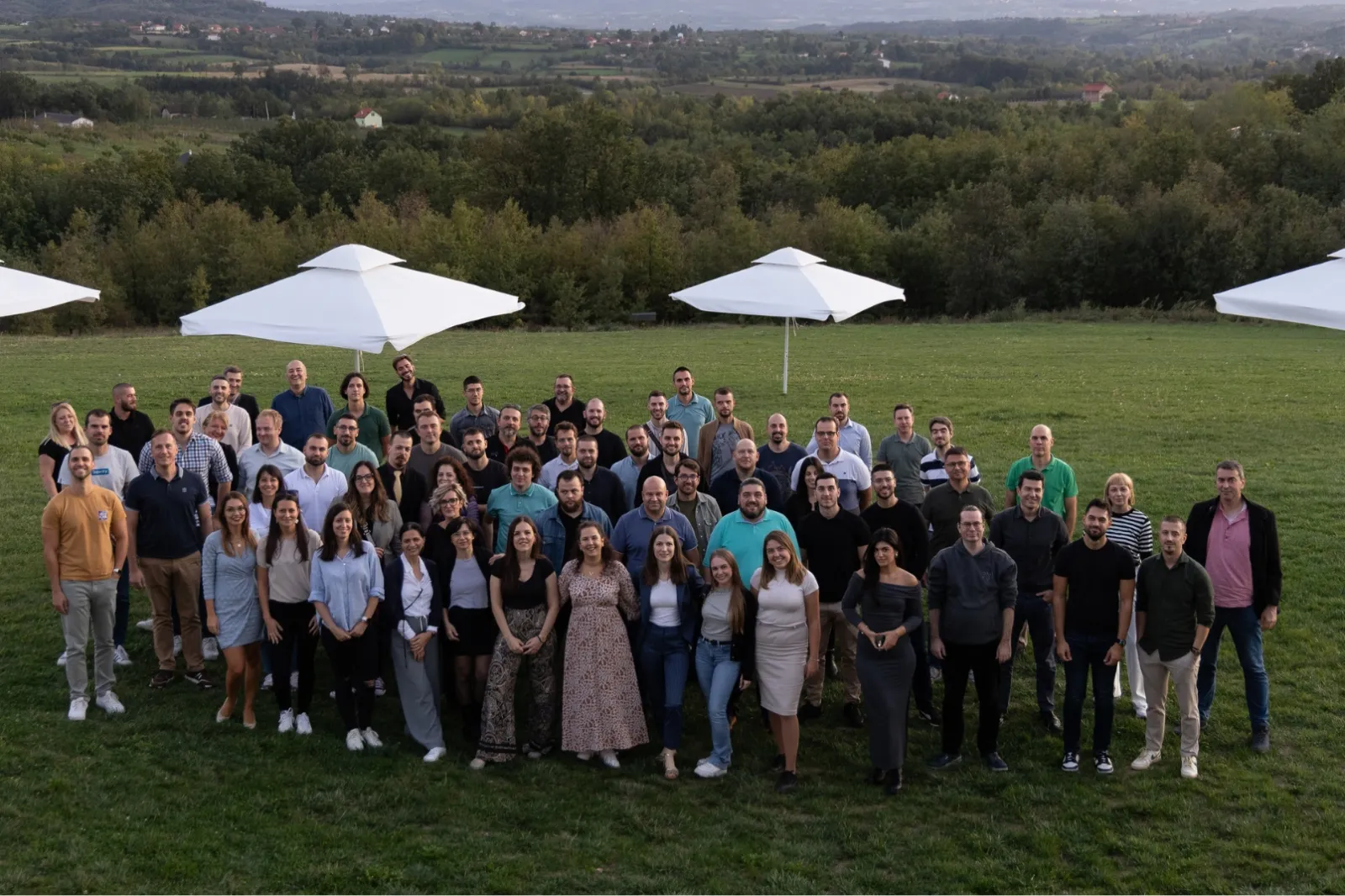 A group of people standing in a field