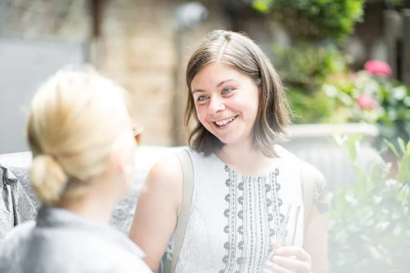 Emese smiling on the team summer social