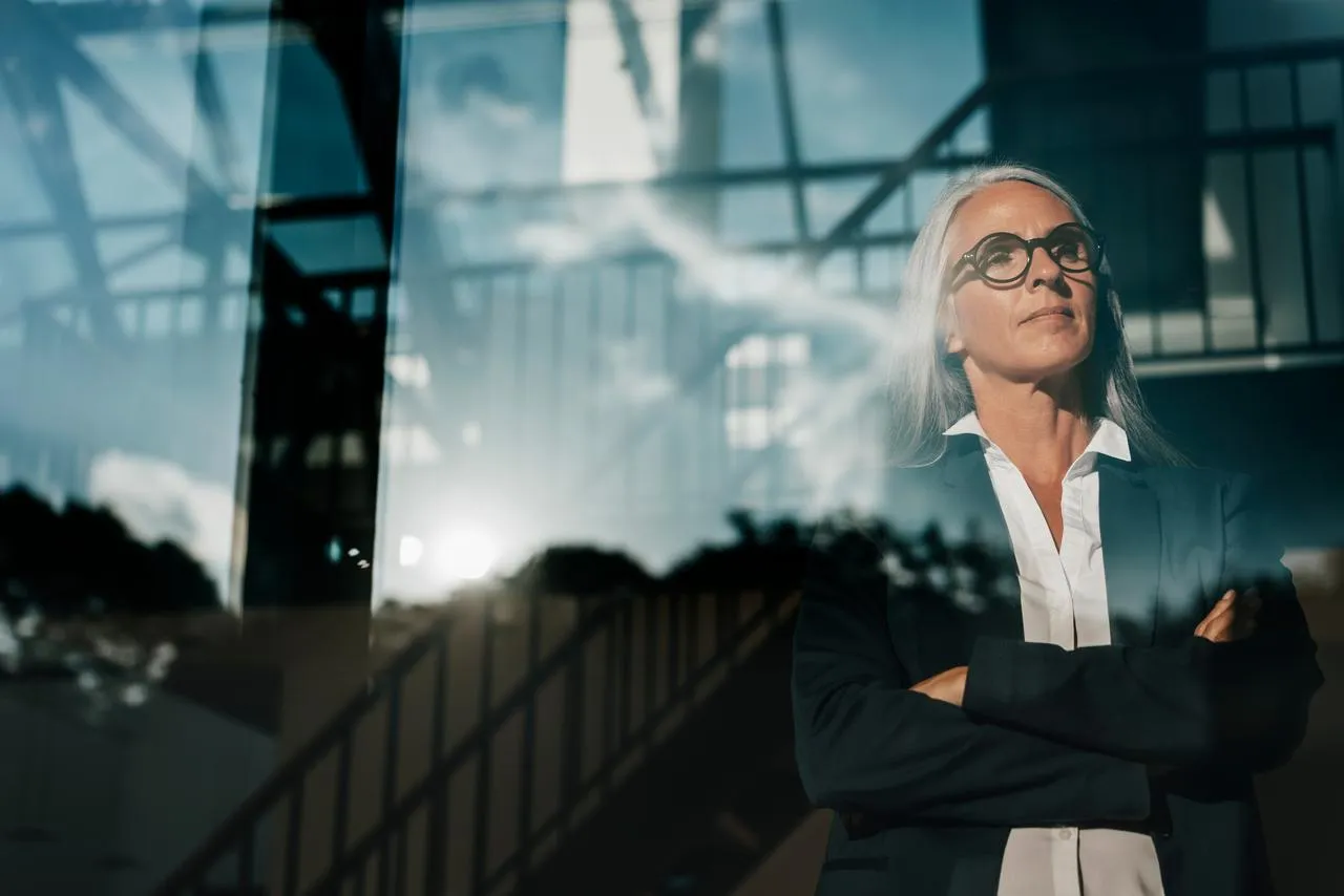 Banking leader looking out of window