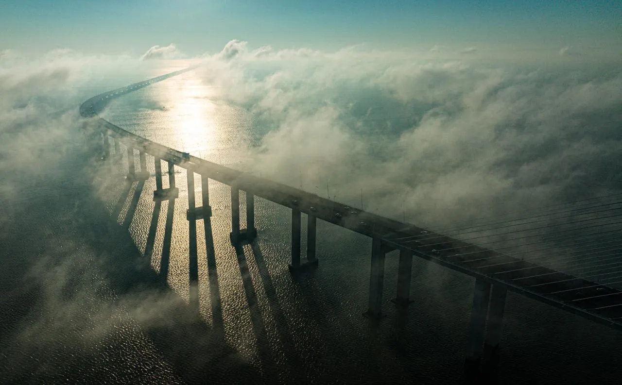 Foggy morning in Lisbon, bridge Vasco da Gama