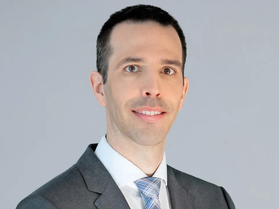 Portrait photo of Rainer Baumann, Group COO, Migros